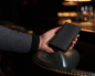 Preview: Geldbörse mit Handyfach aus schwarz genarbtem Kalbsleder 8cc -PORTUNES-